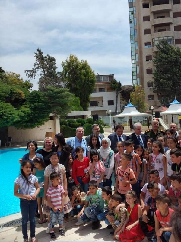 غرفة سياحة المنطقة الوسطى وفندق سفير حمص يحتفيان ب 300 طفلا من ابناء الشهداء